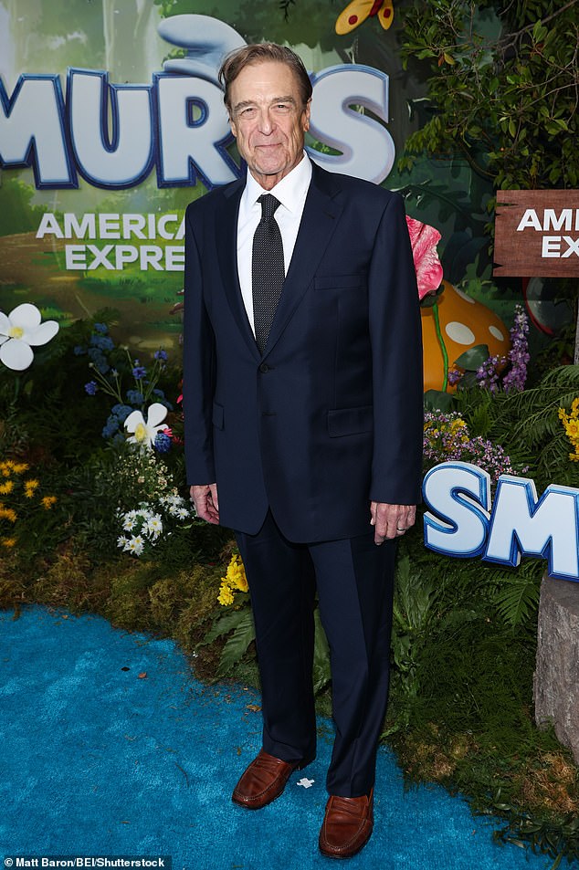 John Goodman was dapper during the screening while sporting a classic dark navy suit