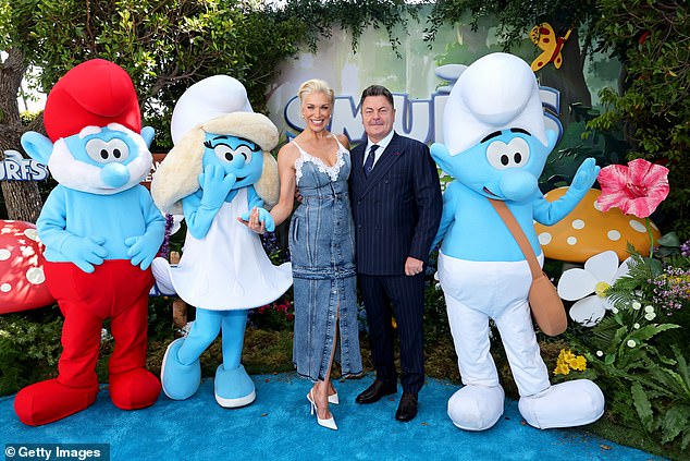 Hannah and Nick were seen crossing paths and paused for a lighthearted snap with a few Smurf characters