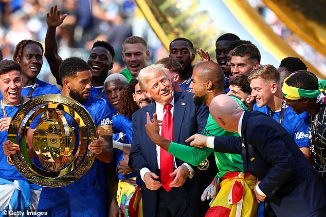 Trump took centre stage for Chelsea's trophy lift, remaining next to Blues skipper Reece James for the historic moment