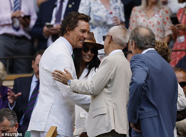 Matthew was joined by his wife Camila Alves, as he was spotted happily greeting fellow spectators in the Royal Box, including Andre Agassi (Seen greeting Sadiq Khan)