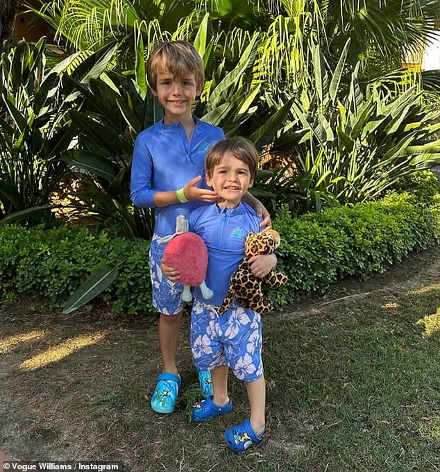 Alongside her holiday post, she penned: 'I¿ve counted down the days until we got here' (pictured: Theodore, left, and Otto, right)