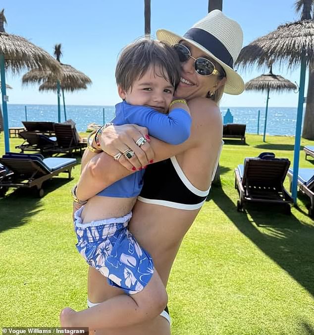 And she has now taken her family abroad to enjoy a sun-soaked beach holiday as the family put on a cuddly display