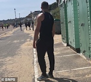 Mr Davies then alleged this man (pictured) pushed him to the ground. Police are now investigating