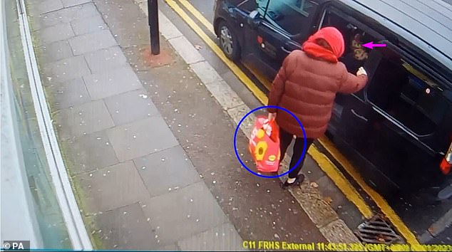 A day after baby Victoria died in their flimsy freezing tent, Marten and Gordon dumped their baby in a soiled nappy inside a Lidl bag for life (pictured East Ham High Street, London)
