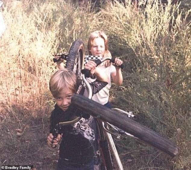 Brad, pictured with Amy as a child, tells the Daily Mail he looks at a picture of Amy nearly every day - and that he and his family 'don¿t leave any stone unturned. We follow up on every lead. You can¿t stop trying' to find her
