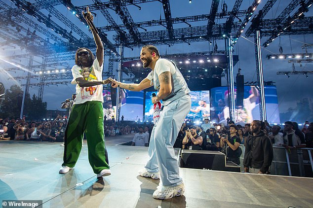The rapper arrived on stage 10minutes earlier than his scheduled time and warned the crowd that he would perform until his microphone was cut off - referring to the strict 21:30 curfew; pictured with Vybz Kartel