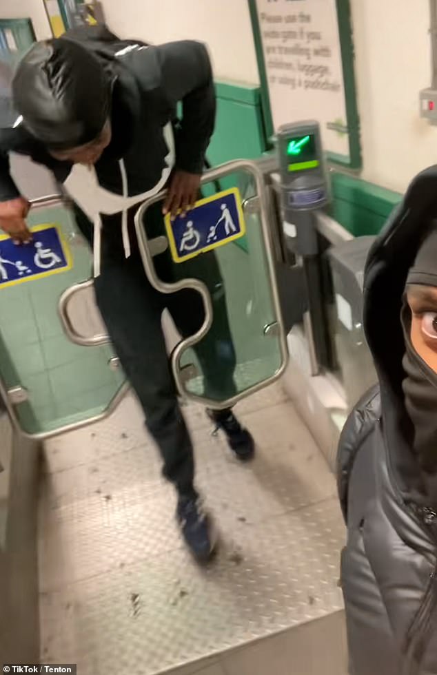 Another video by a TikToker called Tenton shows him push through the barriers and ask: 'Mandem, at what age are we gonna stop bumping train?'