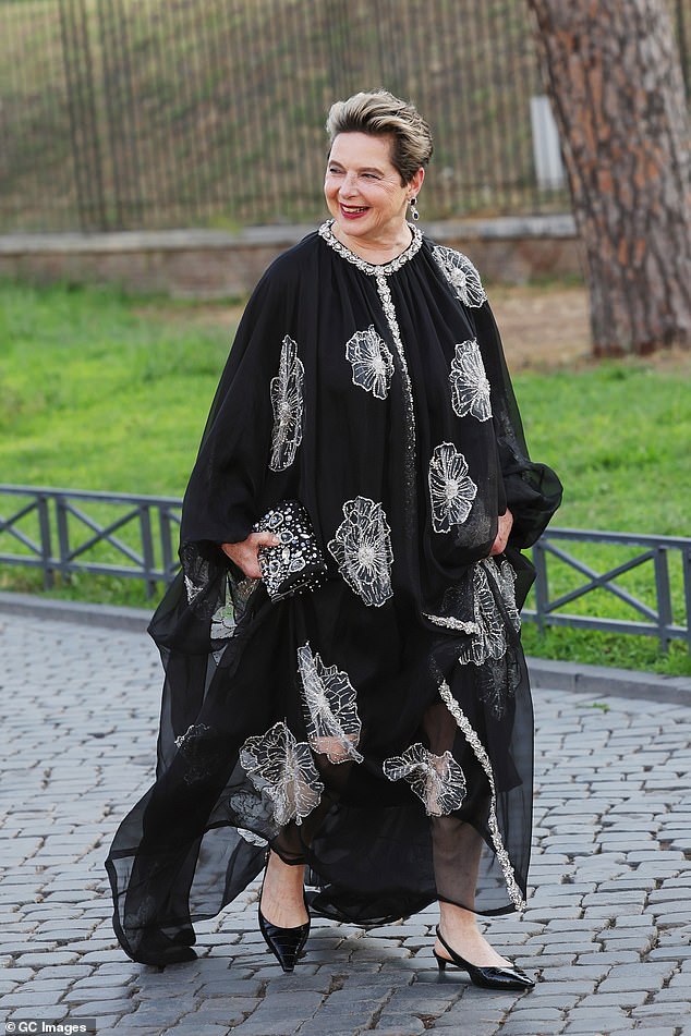 Elsewhere Isabella Rossellini commanded attention in a black cape gown which was embellished with intricate floral designs
