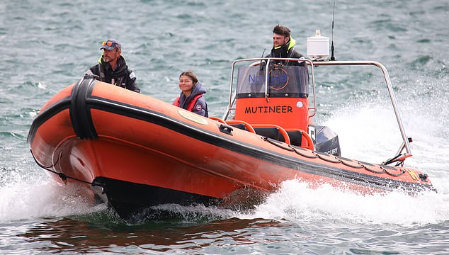 While Zendaya was later seen arriving back at Burghead harbour by speedboat, beaming in delight as the vessel zipped across the waves