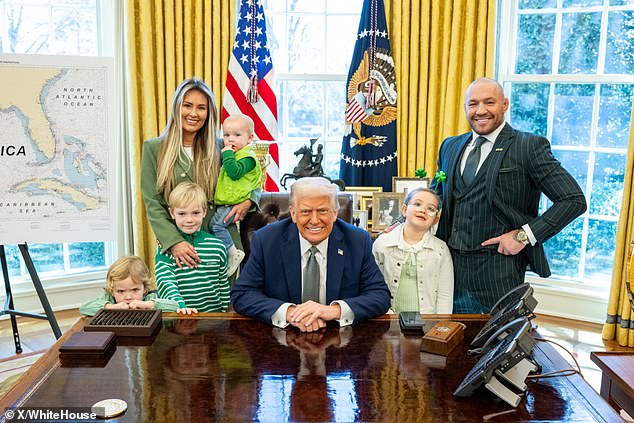 McGregor, Devlin and their four children are pictured with Donald Trump in March