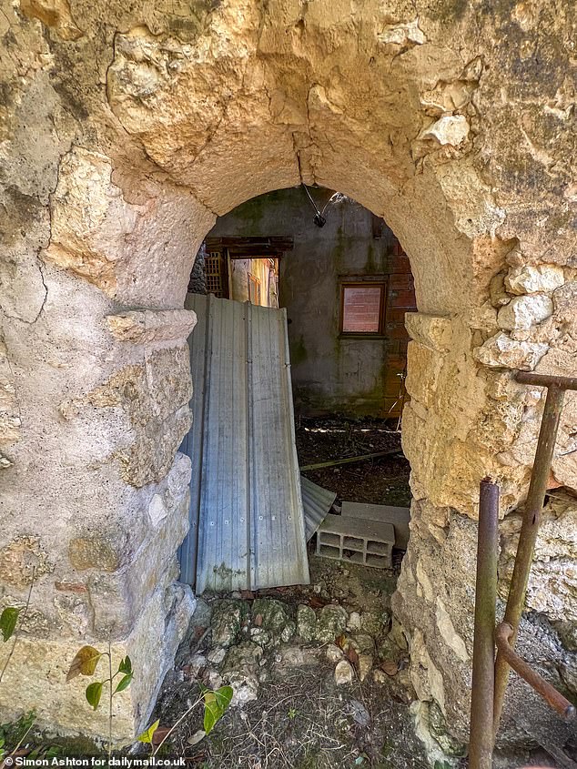 Now, fighting our way past the 6ft high thorns, weeds and ivy surrounding the French property, it’s clear that the robust stonework dating back hundreds of years, looks sturdy enough