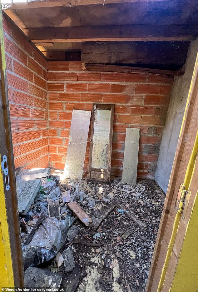 Old beams and broken pieces of furniture are left to rot in the old French property despite initial efforts
