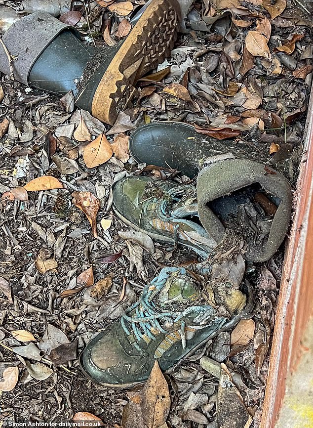 Old trainers and wellies were found discarded in the detritus of the ramshackle house