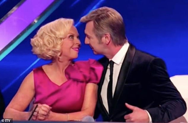 The skaters are evidently used to being in each other's arms, often squaring up close to one another and cuddling up for photos. Pictured together on Dancing on Ice