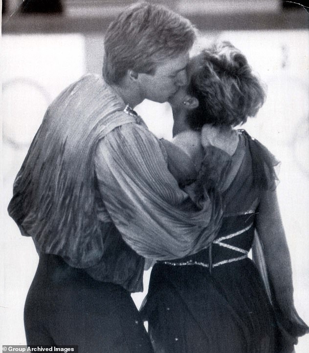 Christopher giving partner Jayne a kiss at the end of a sizzling dance performance that won them a gold medal at the Winter Olympics in Sarajevo