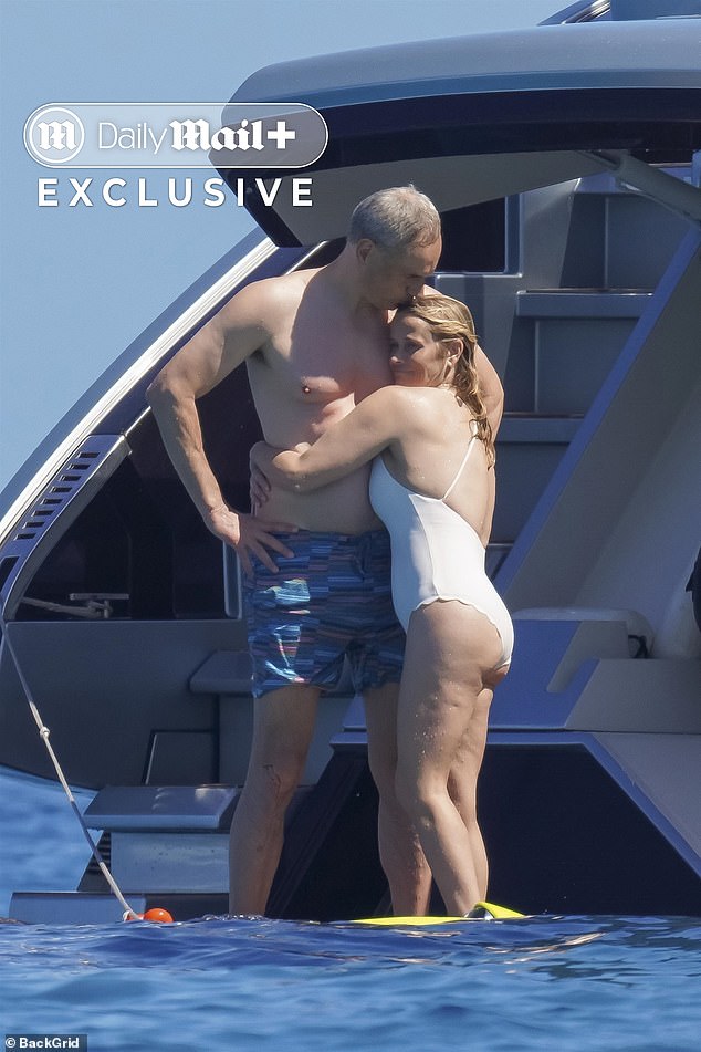 One year after the Daily Mail exclusively revealed the 49-year-old Oscar winner's romance with the German financier, 57, the couple packed on the PDA and embraced as they enjoyed a yacht break