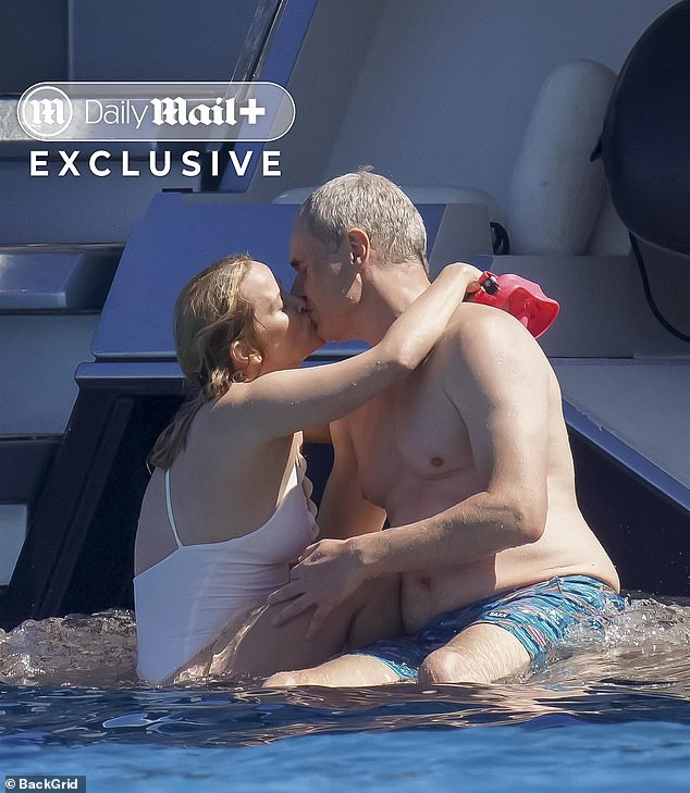 Witherspoon was seen locking lips with a smitten Haarmann