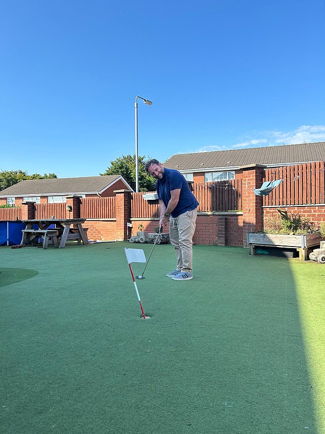 Mail Sport's Riath Al-Samarrai has a go at the four-foot putt that McIlroy sunk to win the Masters