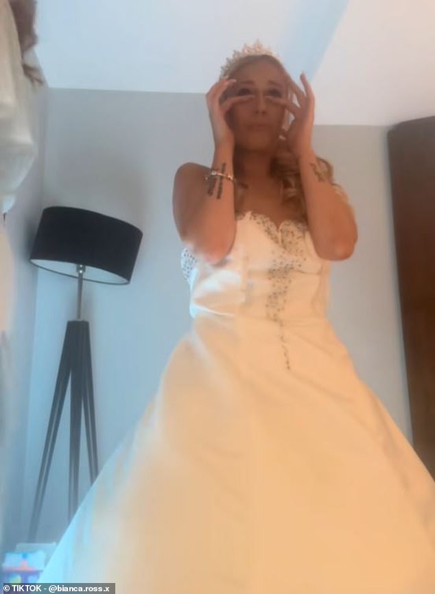 One of the bridesmaids then pulled slightly too hard on the back of the dress which let out a big ripping sound - but she came to the rescue with a sewing kit to mend the tear