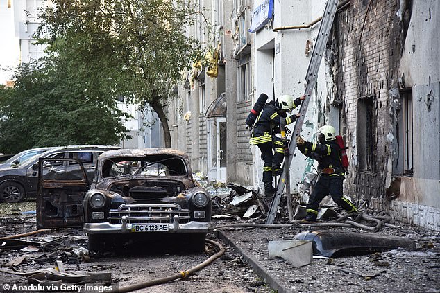Frothing Putin TV propagandist Vladimir Solovyov claimed the arming of Ukraine by NATO meant a full scale war. Pictured: : Emergency teams on duty following Russia's most massive attack on the city since the start of the full-scale invasion in Lviv, Ukraine on July 12
