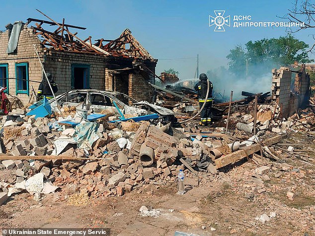 The new Trump deal green lights the supply of a possible $10 billion worth of defensive and offensive missiles and other arms, to be paid for by US allies in Europe along with Canada. Pictured: Firefighters working to extinguish a fire at the site of a burnt private house following a Russian guided aerial bomb attack in Velykomykhaylivka village, Dnipropetrovsk region