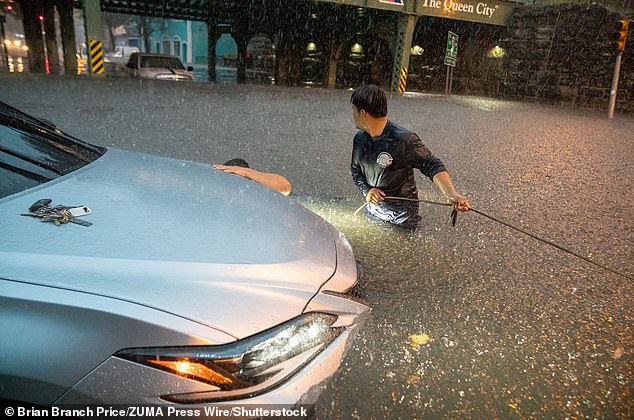 Across the river in New Jersey motorists were left stranded in their cars as the rains came down