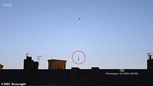 Captured at around 3.30am, the drone them seemingly drops an item into the courtyard