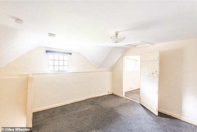Upstairs rooms show larges paces with fitted carpets, small windows high up and wooden doors