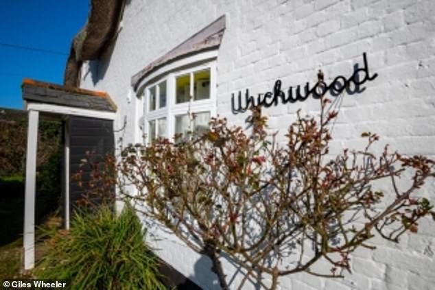 One picture showed the porch, bay windows and a sign bearing the name of the now-demolished Wychwood Cottage