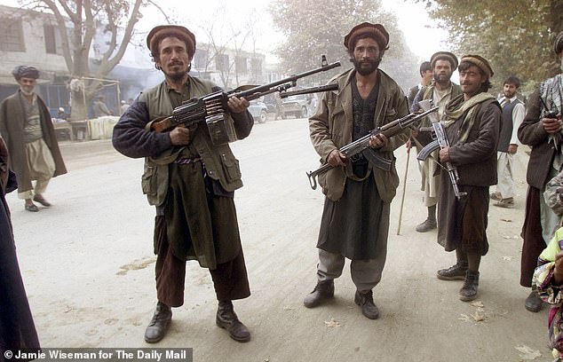 Taliban fighters battling for control of Afghanistan for their warlords - who are now seeking revenge on interpreters and others who served alongside British forces