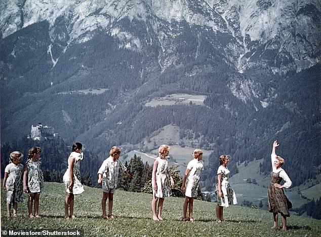 The cast are pictured while filming in Austria in 1965. Kym gushed about the surviving groups enduring friendship in 2022, declaring: 'We're beyond friends. We're second family'