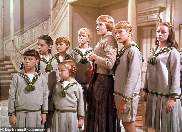 The Sound Of Music cast pictured L-R: Debbie Turner, Angela Cartwright, Duane Chase, Kym Karath, Heather Menzies, Julie Andrews, Nicholas Hammond, Charmian Carr