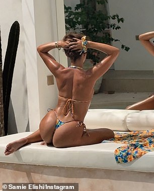 She posed from all angles while looking in the mirror