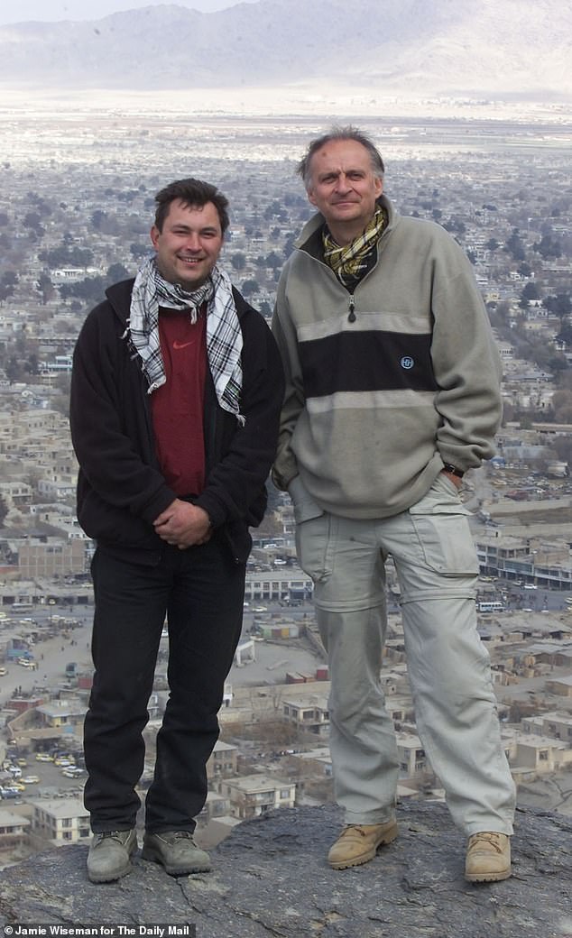 Former Daily Mail Chief Reporter David Williams pictured reporting from Afghanistan in 2001/2002 with The Mail's photographer Jamie Wiseman