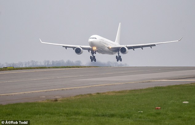 An unmarked Airbus 330-202 from Islamabad touches down at Stansted