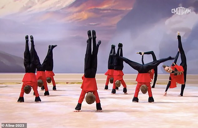 The Russian's leader's alleged secret son was photographed doing a headstand while performing on stage
