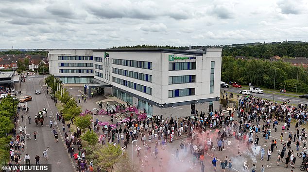 A drone view of demonstrators protesting outside the hotel in Rotherham on August 4, 2024