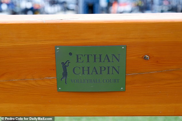 Now the bench overlooking the court has a small plaque bearing Ethan's name in his memory