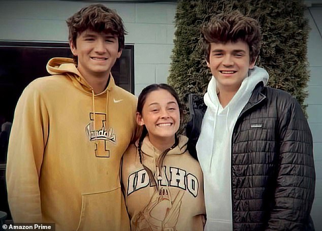 Ethan and girlfriend Xana Kernodle, center, were among the four victims of the heinous attack. They are pictured together with brother Hunter