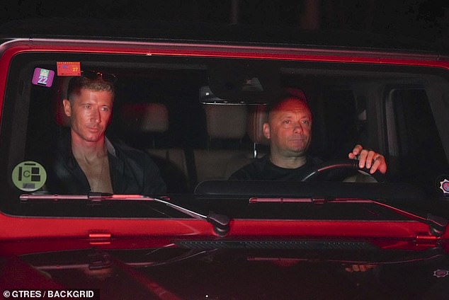 His 36-year-old Barcelona team-mate Robert Lewandowski (left) was pictured arriving