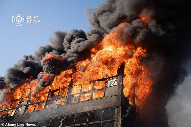 A fireball erupts after a Russian missile strikes the centre of Ukrainian capital Kyiv