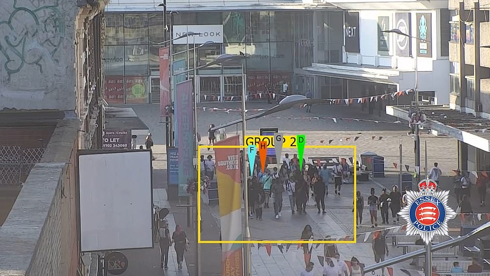 Members of the Southside gang swagger down the busy high street as unsuspecting members of the public walk nearby. Violence would break out shortly afterwards