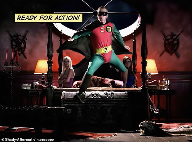 The 52-year-old rap legend - who originally wanted to become a comic book artist - first debuted the Robin-inspired costume in his Grammy-winning music video for Without Me in 2002