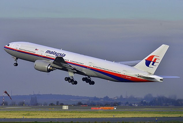Flight MH370, a Boeing 777, was carrying 227 passengers and 12 crew when it vanished en route from Kuala Lumpur to Beijing in 2014 in one of the world's greatest aviation mysteries (File image of a Malaysia Airlines plane)