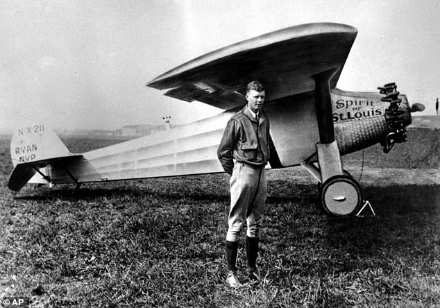 Charles A. Lindbergh poses with his plane 'The Spirit of St. Louis' in this 1927 file photo. Lindbergh credited Alcock and Brown for having 'showed us the way'