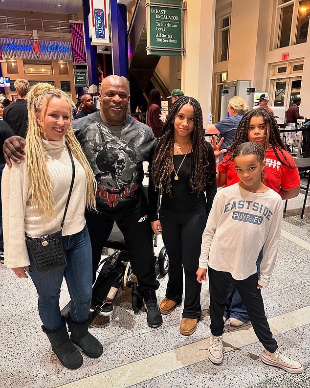The 61-year-old is pictured with his wife Susan Williamson and three of his daughters
