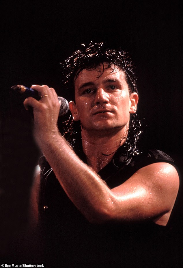 He added: 'The house was two miles away from the runway where my brother Norman worked for Aer Lingus. He had talked them into allowing him to bring home the surplus food from the airline' (Bono pictured 1986)