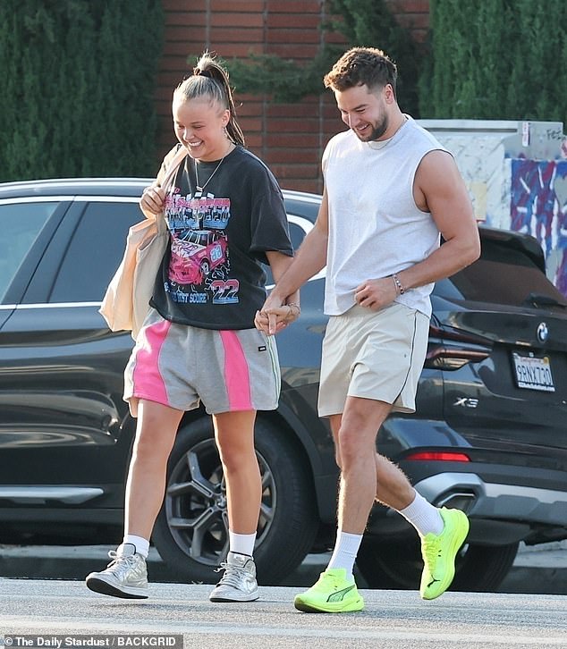 The loved-up pair couldn't keep their hands off each other as they headed out together, with Chris himself gushing that he's 'in love' with JoJo, before calling her his 'princess'