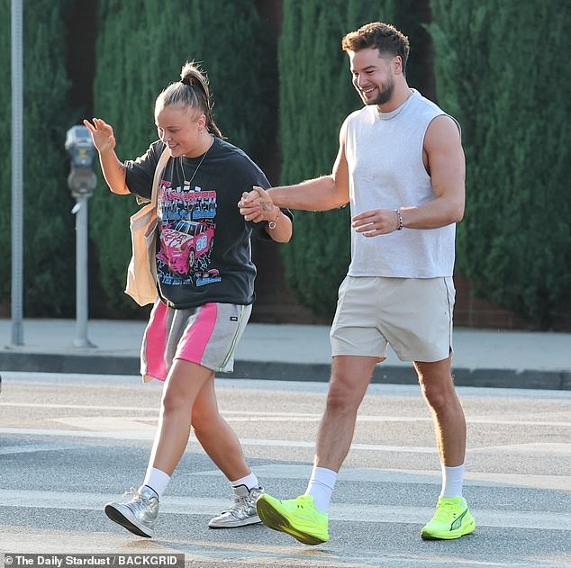 JoJo was playing into online speculation that she could be expecting after Chris gently rubbed his finger over her tummy during a recent TikTok video