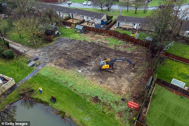 The demolition of the unauthorised £200,000 luxury spa complex at the home of Captain Tom Moore 's daughter has finally been completed
